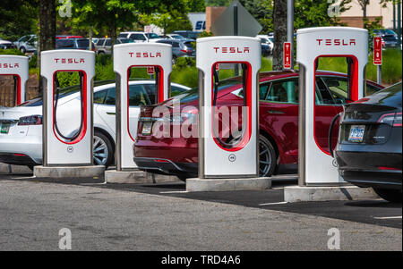 Tesla cars at Tesla Supercharger stations near Atlanta, Georgia. Stock Photo