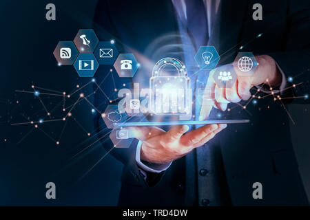 Businessman protecting data personal information on tablet, Data protection privacy concept, SSL Certificate, Cyber security network, Padlock icon Stock Photo