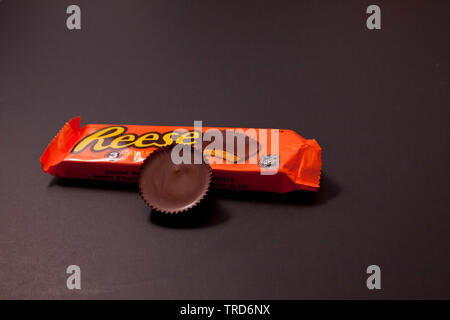 Halifax, Canada- May 31, 2019: Package of Reese's Peanut Butter Cups with one cup out Stock Photo