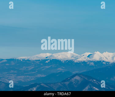 view to Zapadne Tatry mountains from Martinske hole in Lucanska Mala Fatra mountains during amazing winter day with clear sky