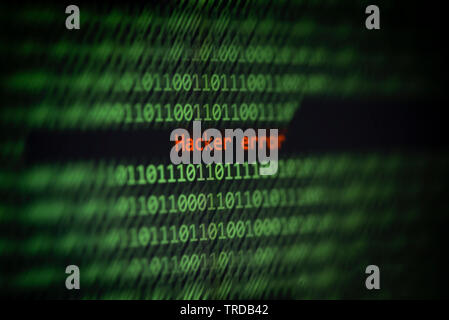 Hacked computer technology binary code number data alert ! Hacker error on display screen / Criminals internet activity or cyber thief security hackin Stock Photo