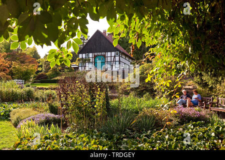 timpered house in the botanical garden Bielefeld in the late summer, Germany, North Rhine-Westphalia, East Westphalia, Bielefeld Stock Photo