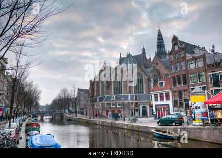 canal and Oude Kerk in the inner city, Netherlands, Amsterdam Stock Photo