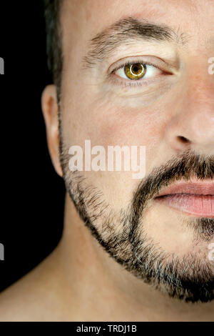 bearded man, one side of the face Stock Photo