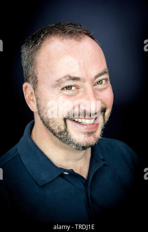 bearded middle-aged man smiling, Germany Stock Photo