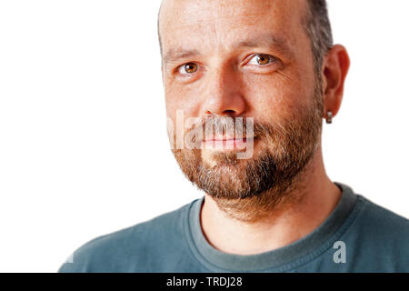 bearded sympathetic man in front of white background, Germany Stock Photo
