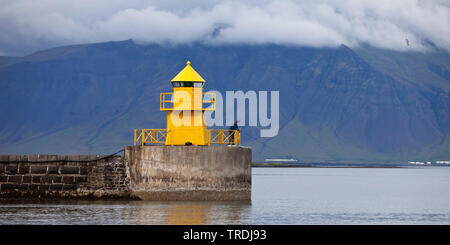 lighthouse at the harbour entrance, Seltjarnarnes, Iceland, Reykjavik Stock Photo