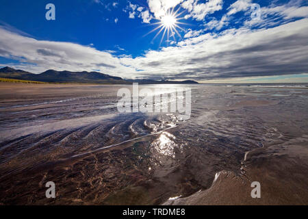 tidelands in backlight, Iceland, Snaefellsnes, Vesturland, Vallnavik Stock Photo