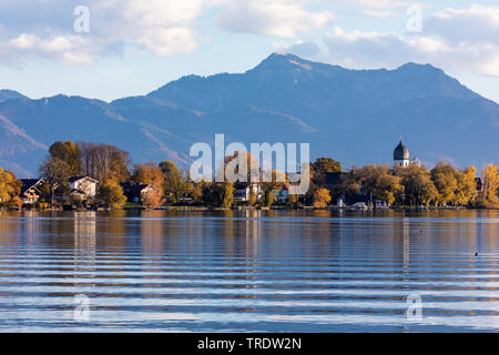 island Frauenchiemsee in front of the Alps in autumn, Germany, Bavaria, Lake Chiemsee Stock Photo