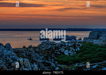Atlantic coast Pointe de Penhir in red sunset, France, Brittany, Crozon Stock Photo