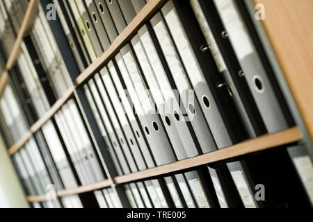 Detail of shelves filled with files and folders Stock Photo