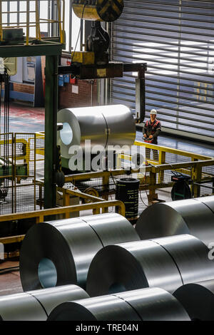 Duisburg, Ruhr area, North Rhine-Westphalia, Germany - ThyssenKrupp Steel Europe, steel production in the steel mill, hot-dip galvanized steel coils a Stock Photo