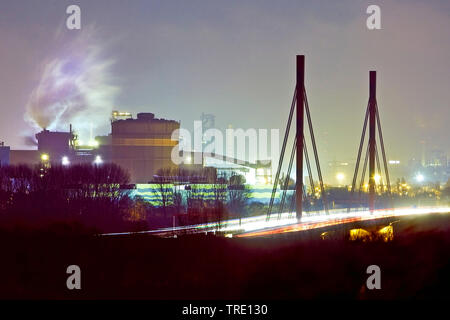 ThyssenKrupp plant and motorway A42 at night, Germany, North Rhine-Westphalia, Ruhr Area, Duisburg Stock Photo