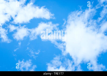 blue sky with white clouds in sunlight Stock Photo