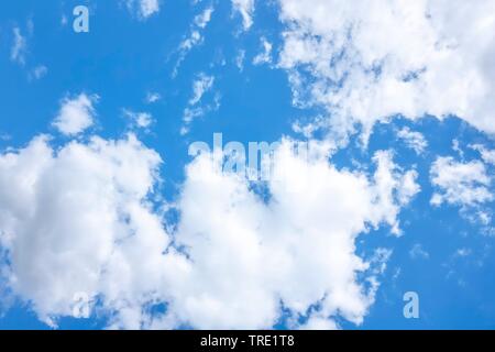 blue sky with white clouds in sunlight Stock Photo