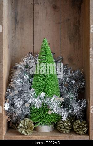 wooden box with Christmas tree, cones and garland, christmas decoration Stock Photo
