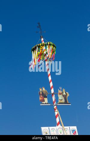 Maypole with guild sign Stock Photo - Alamy
