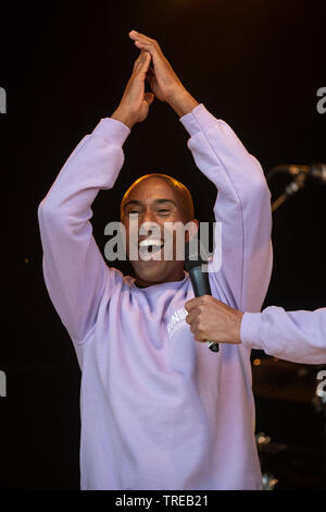 Colin Jackson, British former sprint and hurdling athlete who specialised in the 110 metres hurdles. On stage at the Run Fest Run festival, Wiltshire. Stock Photo