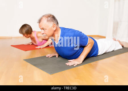 woman and man doing yoga, Europe Stock Photo
