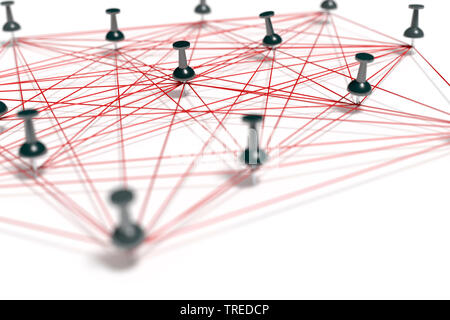 Pins connected with red twines, symbolizing a network structure Stock Photo