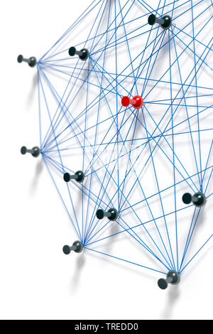Pins connected with blue twines, symbolizing a network structure Stock Photo