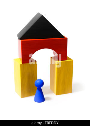 House built out of wooden bricks in the national colors of Germany Stock Photo