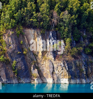 Prangenhaus limestone quarry, rock wall and lake, Germany, North Rhine-Westphalia, Bergisches Land, Wuelfrath Stock Photo