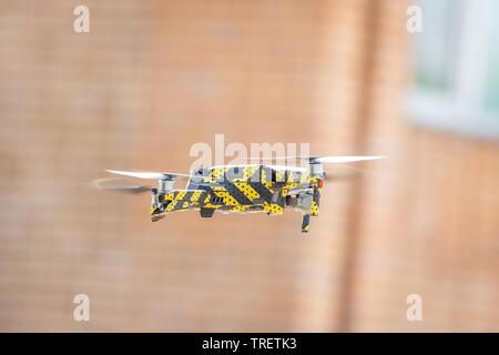 Drone quadcopter on nature background with a copy space. Top view, flat lay composition Stock Photo