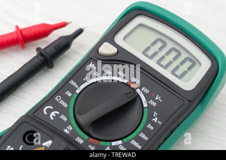 Multimeter measuring device on a light table Stock Photo