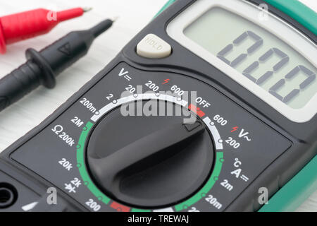 Multimeter measuring device on a light table Stock Photo