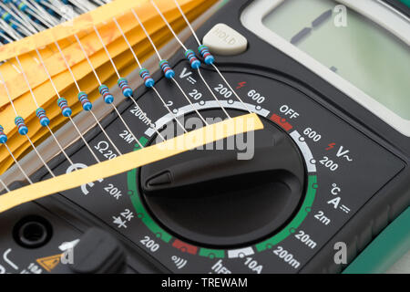 Multimeter measuring device on a light table Stock Photo