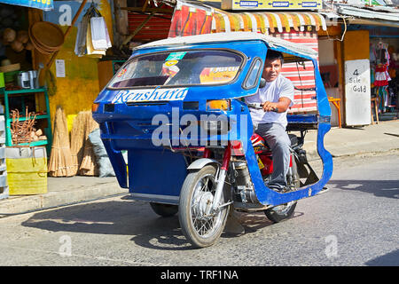 Colorful Tricycle Taxi, a motorbike with sidecar that's an iconic part ...