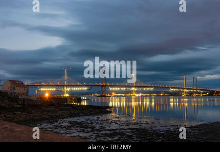 Three Forth Bridges at dusk with Queensberry Crossing still under construction Stock Photo