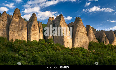 France, Alpes-de-Haute-Provence (04), Les Mées - Sunset on rock formation near the village of Les Mées, named 'Les Pénitents' Stock Photo
