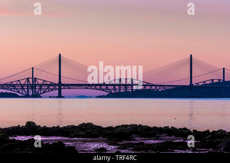 Sunrise with the three Forth Bridges at South Queensferry Stock Photo