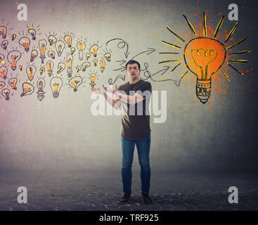 Casual young man, confused face expression, holding hands outstretched as receiving a lot of ideas gathering and create a conclusion. Ingenious studen Stock Photo