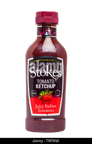 A new plastic bottle of Stokes Tomato Ketchup sauce on a white background Stock Photo