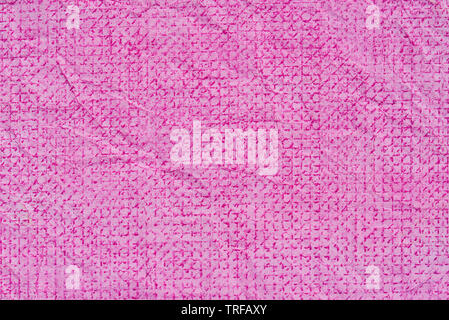 pink crayon pattern on creased paper background texture Stock Photo