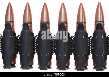 Machine gun belt loaded with 7.62x39mm USSR cartridges isolated on white Stock Photo