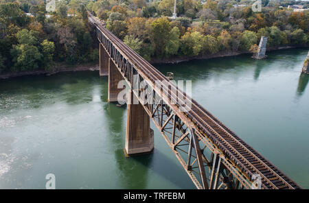 Scenic Daytime Aerial Drone Outdoor Photography Vintage Rust Covered Old Steel Railroad Train Track Crossing Historic Potomac River in Maryland, USA Stock Photo
