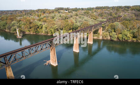 Daytime Aerial Landscape Photograph Old Vintage Rusted Steel Train Track Structure Crossing Historic Potomac River in Maryland, USA Stock Photo