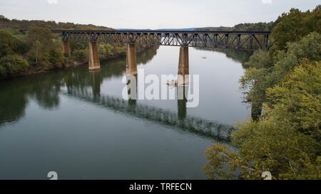 Daytime Aerial Landscape Photograph Rusted Steel Railroad Train Trestle Crossing Historic Potomac River in Maryland, USA Stock Photo