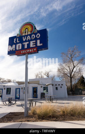 Albuquerque, New Mexico - February 2, 2019: Sign for the El Vado Motel on historic Route 66. Bright blue, red and yellow sign on a sunny morning. Stock Photo