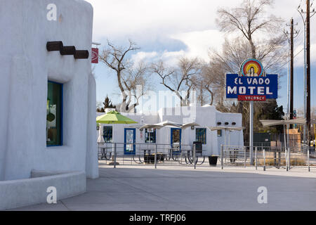 Albuquerque, New Mexico - February 2, 2019: Sign for the El Vado Motel on historic Route 66. Bright blue, red and yellow sign on a sunny morning. Stock Photo