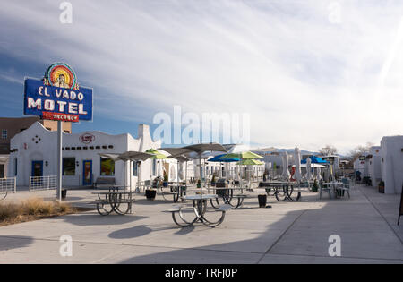 Albuquerque, New Mexico - February 2, 2019: Sign for the El Vado Motel on historic Route 66. Bright blue, red and yellow sign on a sunny morning. Stock Photo