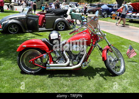 A custom Rev-Tech motorbike amongst vintage vehicles and Hot Rods at a memorial day event at Boulder City, Nevada, USA Stock Photo