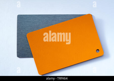 Concept of color cards on white background two colors gray and orange isolate on white background. Stock Photo