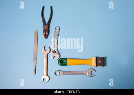 Various tools laid out flat for doing work around the house or construction project Stock Photo