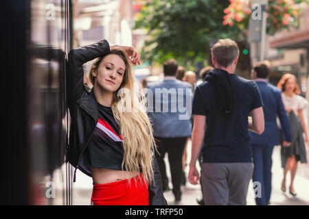 young woman posing in the city Stock Photo