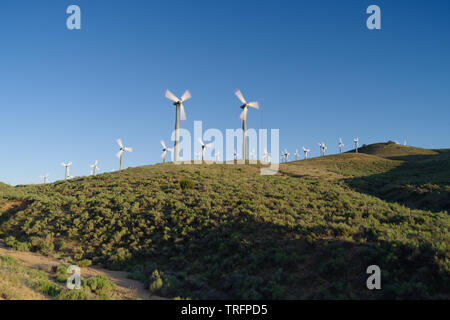 Wind turbines in Kern County in Southern California. Stock Photo